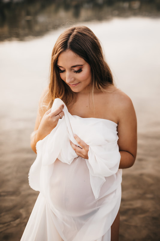 Beach styled maternity photoshoot in Kamloops B.C. Makeup by Sarah Fisher Beauty.