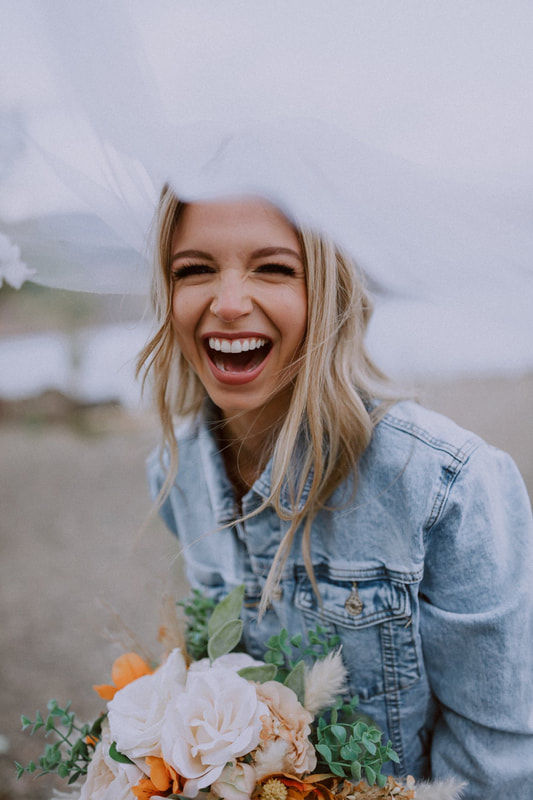 Makeup for Kamloops elopement. Bridal Makeup look, smiling bride.